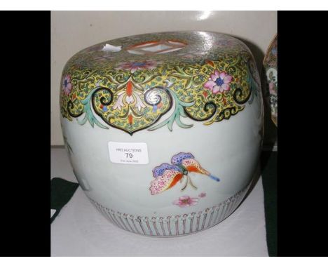 A 19th century Chinese ceramic child's garden seat with flower and butterfly decoration - 20cm high and 23cm diameter CONDITI