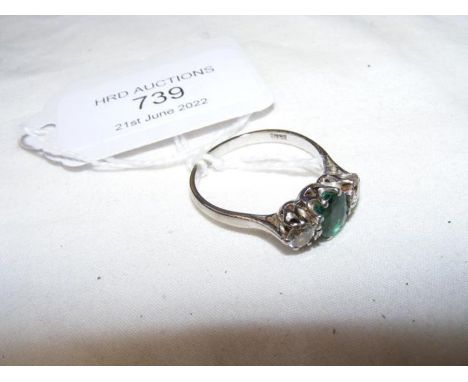 A lady's emerald and diamond ring in 18ct white gold setting CONDITION REPORTAs per imagesSize R/S