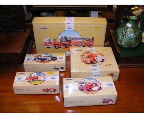 Five boxed Corgi die cast vehicles, including Fire Engine 