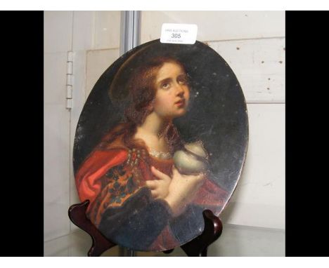 An oval portrait with inscription to reverse - 21.5cm 