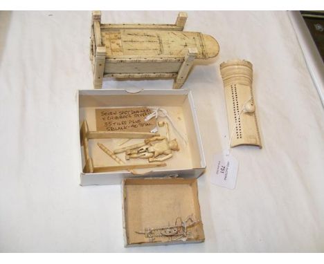A 19th century carved bone prisoner of war games box - with seven spot dominoes, cribbage streets, 35 tiles and 5 blanks 