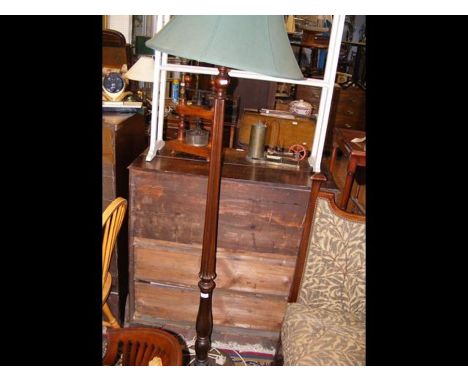 A reeded standard lamp 