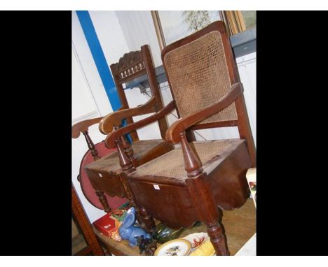 A German commode chair, together with one other and an oval footstool 