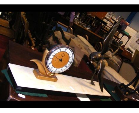A French mantel clock with 'flying swallow' mount - 56cm wide 