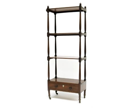 A Regency mahogany whatnot, circa 1820, acorn finials, four graduated tiers united by baluster and ring turned supports, the 