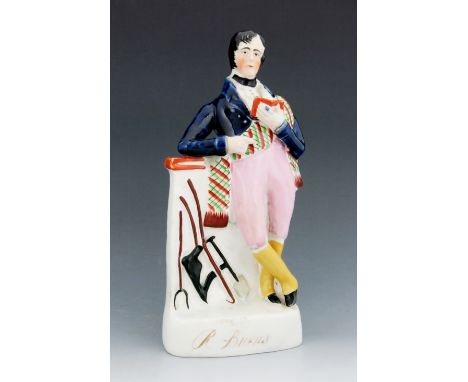 A Staffordshire figure of Robert Burns, circa 1850, modelled standing, leaning against a plinth with agricultural tools, a bo