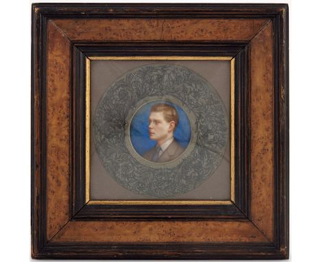 A portrait miniature of King Edward VIII, gouache, inscribed in gilt within a foliate scroll border, Vidal Brunton Angess Jul