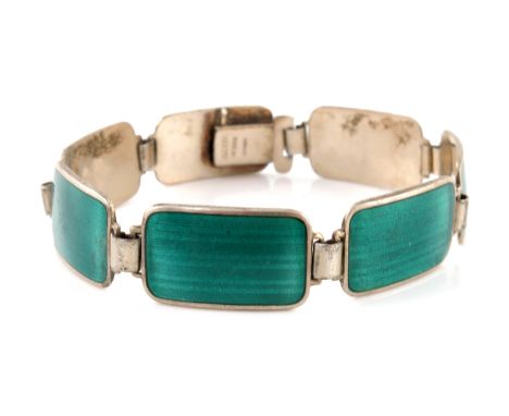 Aksel Holmsen, a Norwegian silver gilt and enamelled bracelet, seven cushioned rectangular panels of emerald green pinstripe 