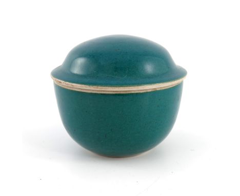 David Lloyd Jones (1928-1994), a studio pottery box and cover, rounded bowl form with ogee domed lid, powder green glazed wit