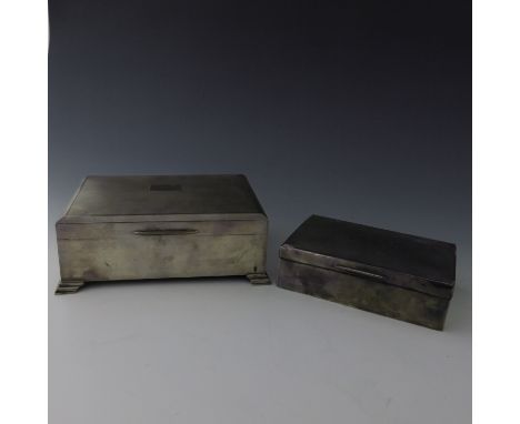 An Elizabeth II silver table cigarette casket, machine engraved cover, stepped bracket feet, maker J.B. Chatterley &amp; Sons