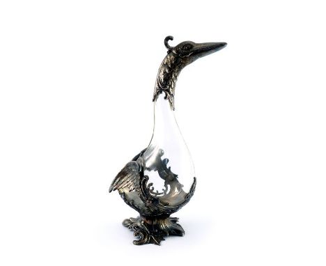 WMF, a novelty silver plated and glass claret jug, modelled as a bird, the colourless glass body in a relief moulded Rococo s