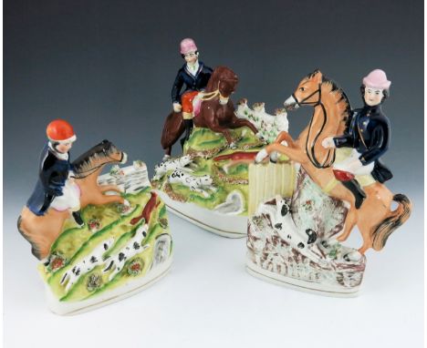 Three 19th Century Staffordshire equestrian figures depicting fox hunting scenes, modelled as hunters on horseback with chasi