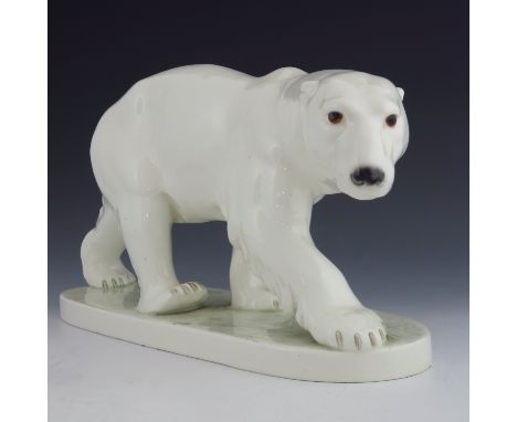 Sigismund Wernekinck for Goldscheider, Polar Bear, model 4144, circa 1911, modelled striding on an oval plinth, impressed mar