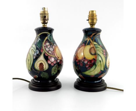 Emma Bossons for Moorcroft, two Queens Choice lamp bases, baluster form on wooden bases, 26cm high to fittings (2)