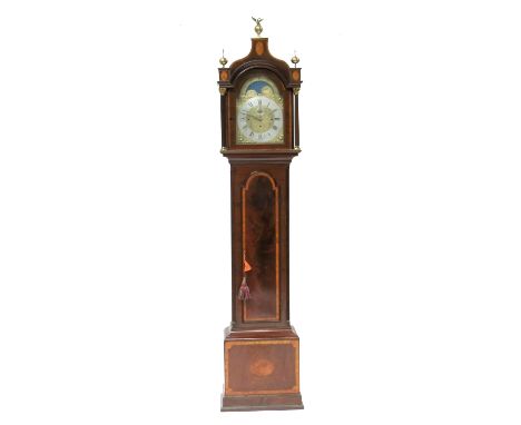 Thomas Tanner, London, a George III musical mahogany crossbanded longcase clock, arched hood with ball and eagle finials and 