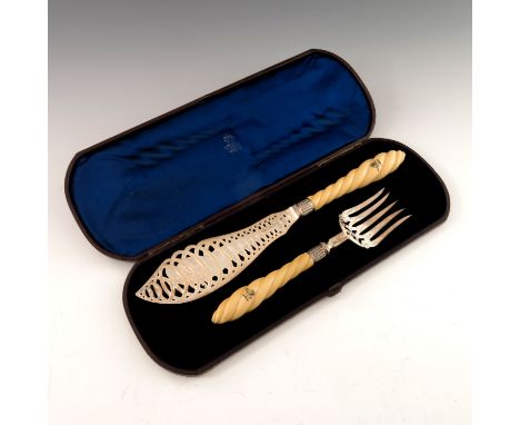 A pair of Victorian silver and ivory handled fish servers, Atkin Brothers, Sheffield 1860, the carved rope form handles with 