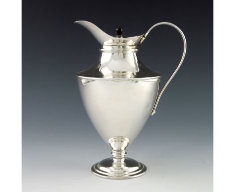 W A S Benson, an Arts and Crafts silver plated insulated pedestal jug, circa 1900, footed urn form with strap handle and helm