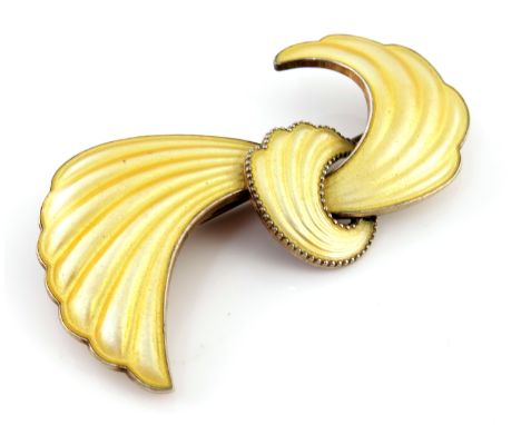 Elvik and Co., a Norwegian silver gilt and enamelled brooch, knotted crimped bow form in yellow enamel, 6cm long, 13.4g