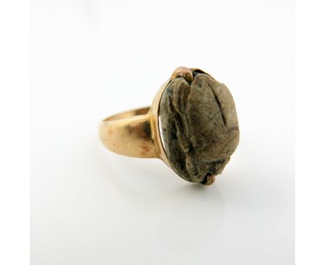 An 18ct gold scarab amulet ring, marks rubbed, 18mm diameter, total weight 5g