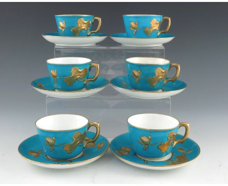 Christopher Dresser for Minton, a set of six Aesthetic Movement tea cups and saucers, 1875, bleu celeste ground, relief mould
