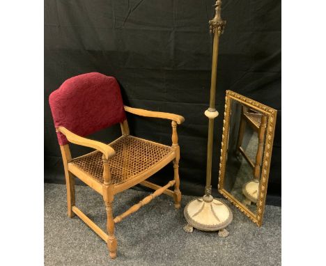 A neoclassical gilt metal and Alabaster standard lamp;  rattan arm chair;  gilt framed rectangular mirror (3) 