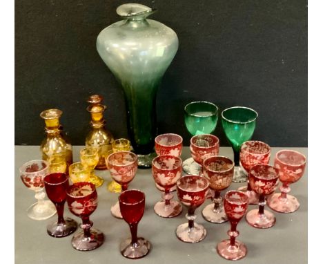 Victorian acid etched ruby glass glasses;  two emerald glasses;  amber glass liqueur set  etc 