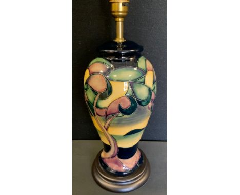 A Moorcroft Western Isles pattern inverted baluster table lamp, designed by Sian Leaper, wooden base, shade, 62cm overall 