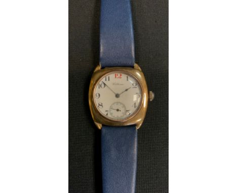 A George V 9ct gold cased Waltham wristwatch, white enamel dial, Arabic numerals, minute track, subsidiary seconds, seven jew