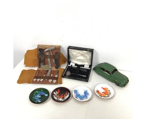 A mixed lot including a 1950s model car, stamped Chad Valley, Harborne to base (19cm x 7cm), four Welsh enamelled copper dish
