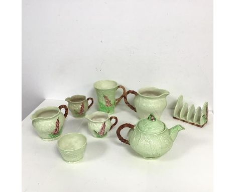 A Carltonware batchelor's morning tea service comprising teapot (h.13cm x 19cm x 12cm), milk jugs, sugar bowl, hot water jug,