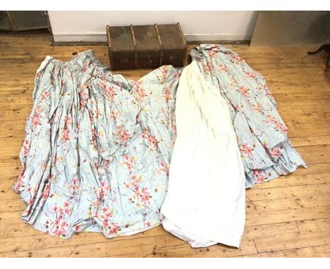 A suite of four linen curtains, printed with birds amongst foliage on a pale blue/grey ground, together with a wooden framed 
