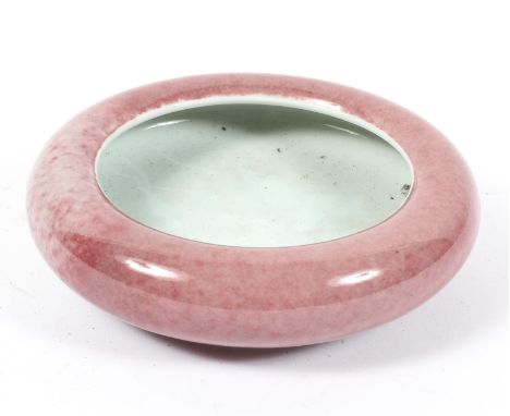 A Chinese peach bloom brush washer, Kangxi marks but later, blue painted six character marks, 12cm diameter