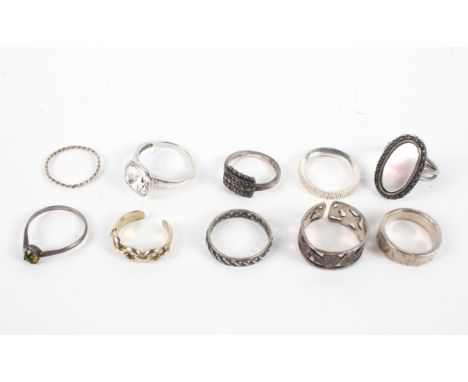 A collection of ten silver rings of variable designs. Size range from K to P Gross weight: 25.3 grams