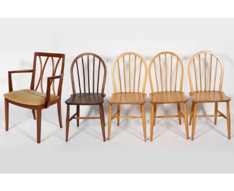 A set of four Ercol stick back dining chairs, one stained and bearing Ercol label; together with a G Plan teak elbow or carve