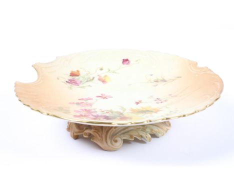 A 19th Century Royal Worcester dessert or cabinet plate, of Rococo outline with gilt moulded rim, painted with wildflowers on