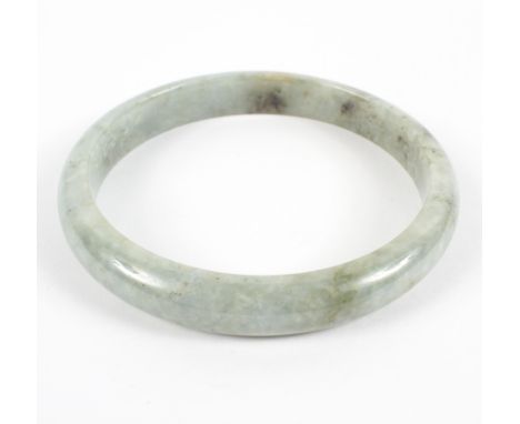 A circular Jade bangle measuring approximately 95.0mm diameter. NB: Untested for natural origin. 77.0 grams
