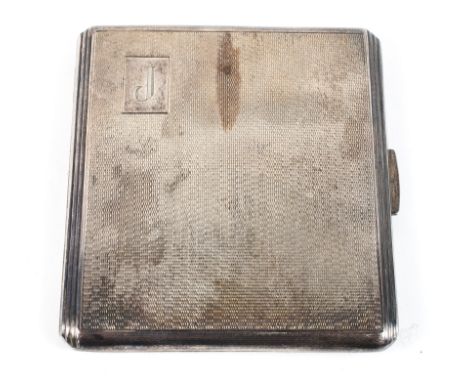 A mid century engine turned silver cigarette case of square form, gilt interior, hallmarked Birmingham 1961 by Harman brother