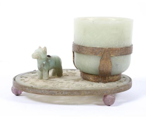 A Chinese 'jade' brush pot and stand, the base with pierced scrolling decoration, with gilt brass mounts, 10cm long