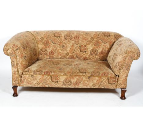 A Chesterfield sofa, with drop arm, on turned legs, 74cm high x 170cm wide x 90cm deep