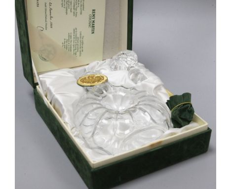 A Baccarat Remy Martin glass decanter, boxed