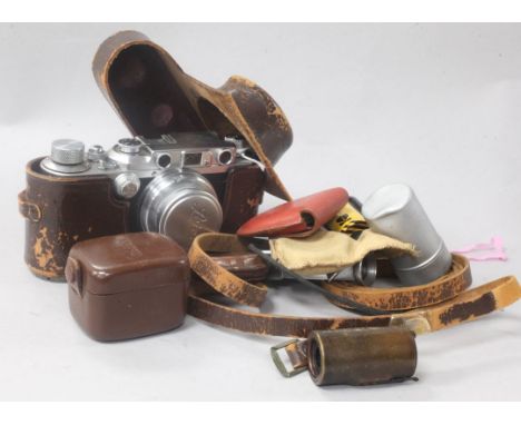An Ernst Leitz Wetzlar Leica D.R.P. IIIA Rangefinder camera, Serial No. 279925, in original case (a.f), with accessories