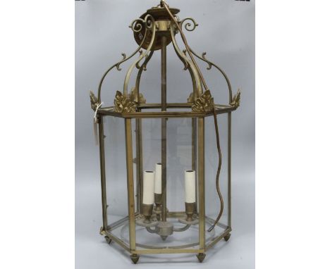 A brass hexagonal hanging hall lantern (one glass panel deficient)