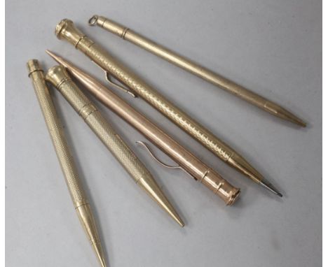 Five 9ct gold overlaid pencils including four engine turned and one by Sampson Mordan & Co.