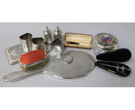 Assorted silver including a pair of engine turned napkin rings, pair of pepperettes and a hand mirror and three other items i