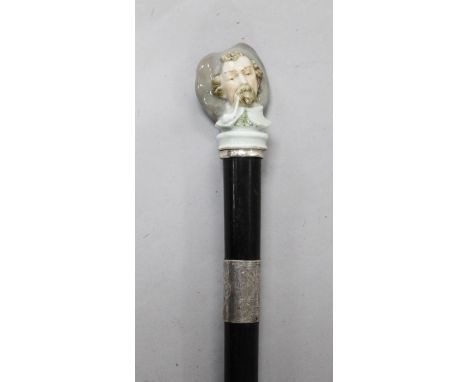 A porcelain bust topped walking stick