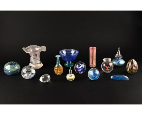 A collection of paperweights, including maker's such as Eirian, Caithness, and others, five in total, a bowl and figural vase