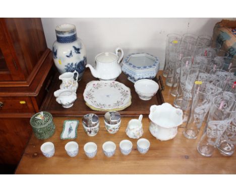 A quantity of china to include Royal Worcester egg coddlers; honey jar; egg cups; blue and white jardiniere; a twin handled t