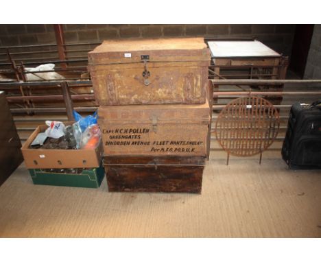 A japanned metal travelling trunk and two larger similar 