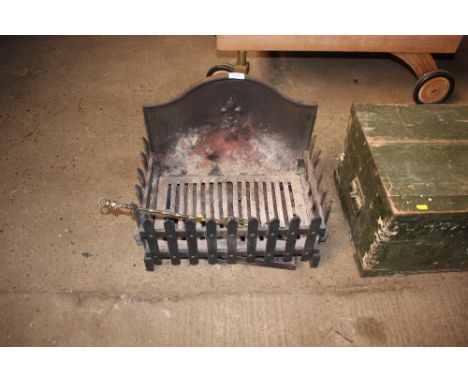 A cast iron fire grate and back 