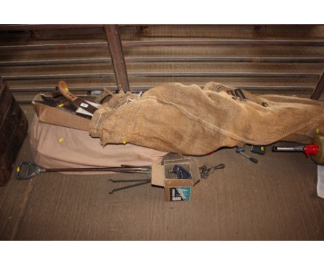 A quantity of sundry items to include various saws; tools etc.